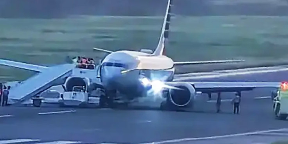 Two Tyres on the Left Main Landing Gear of an American Airlines B737-8 MAX Burst