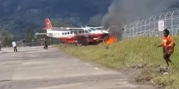 Cargo Plane Skids Off Runway and Catches Fire in Indonesia