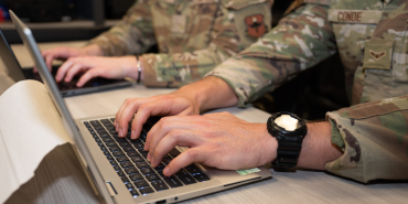 250421_DVIDS_airmen_typing_8891872-scaled-e1745262439703