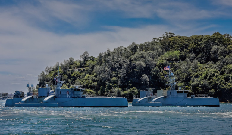 Unmanned Surface Vessel Division One’s (USVDIV-1) unmanned surface vessels (USVs) Ranger, Mariner, Seahawk and Sea Hunter arrived in Sydney, Australia, for a scheduled port visit October 24, 2023 ahead of their participation in the Integrated Battle Prob