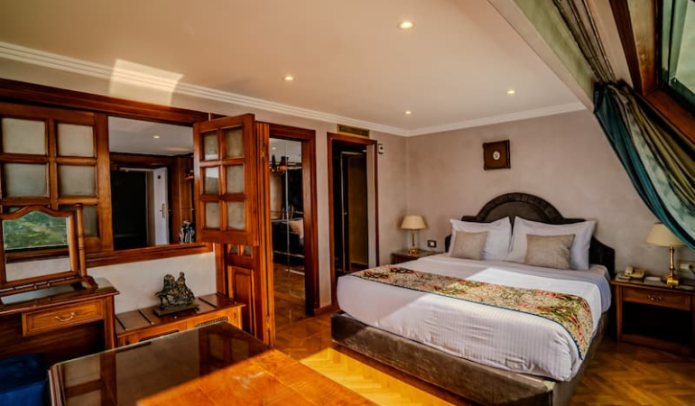 Royal-Panoramic-Suite-King-Size-Bed-Century-Cruises-1-1