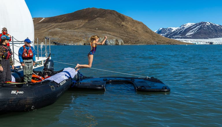 Website_Screen-Family-Travel-kid-polar-plunge-Svalbard