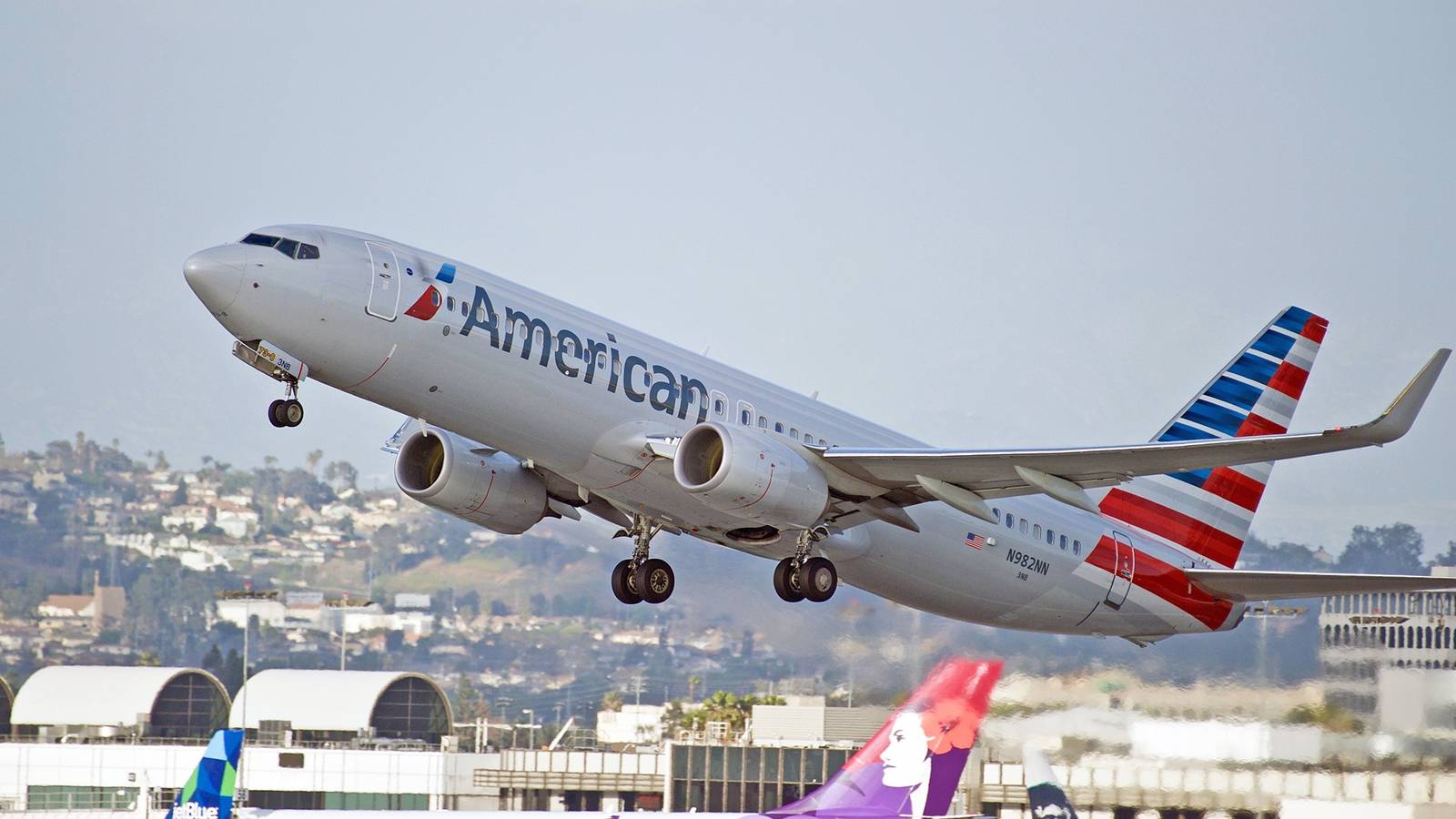 american-airlines-boeing-737-aircraft-is-airborne-as-it-departs-los-angeles-international-airport-los-angeles-california