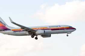 an-american-airlines-boeing-737-displaying-the-retro-livery-of-air-cal-airlines-on-final-approach-at-the-miami-international-airport