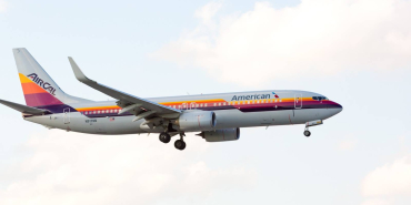 an-american-airlines-boeing-737-displaying-the-retro-livery-of-air-cal-airlines-on-final-approach-at-the-miami-international-airport