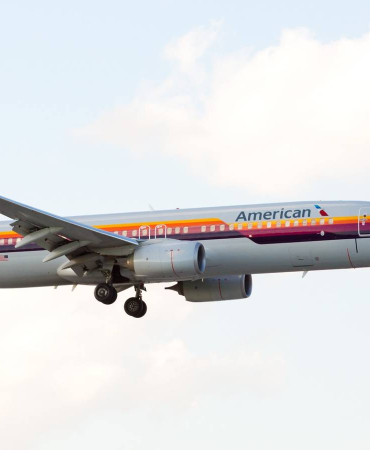 an-american-airlines-boeing-737-displaying-the-retro-livery-of-air-cal-airlines-on-final-approach-at-the-miami-international-airport