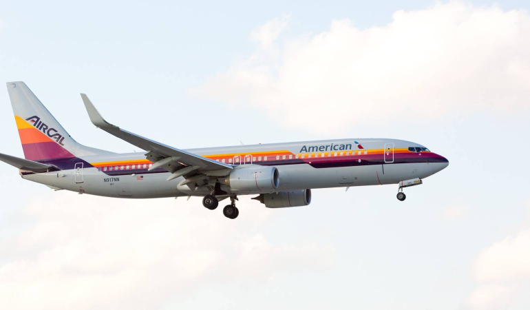 an-american-airlines-boeing-737-displaying-the-retro-livery-of-air-cal-airlines-on-final-approach-at-the-miami-international-airport