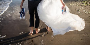 barefoot-couple-enjoying-wedding-day-at-the-beach-2026-03-09-06-07-46-utc-1