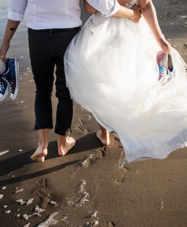 barefoot-couple-enjoying-wedding-day-at-the-beach-2026-03-09-06-07-46-utc-1