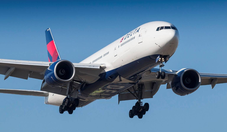 delta_airlines_777-200er_on_short_final_after_a_long_flight_-41344091452