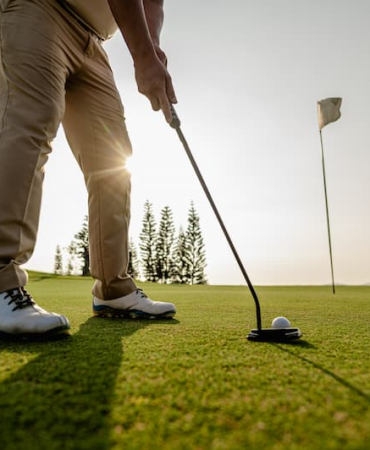 golfer-man-aiming-at-golf-ball-in-a-ready-position-2026-03-16-22-56-01-utc-1