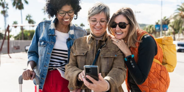happy-women-travelers-taking-a-selfie-outdoors-2026-01-07-06-32-05-utc-1