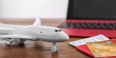 composition-with-airplane-model-passport-and-cred-2026-03-09-19-54-11-utc-1