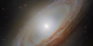 A galaxy spinning out of sync